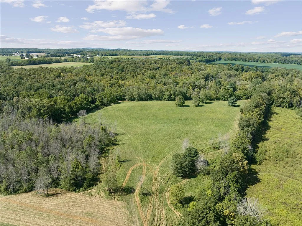Elite Equestrian Estate minutes from Cornell University | Living Quarters + Stables | For Sale